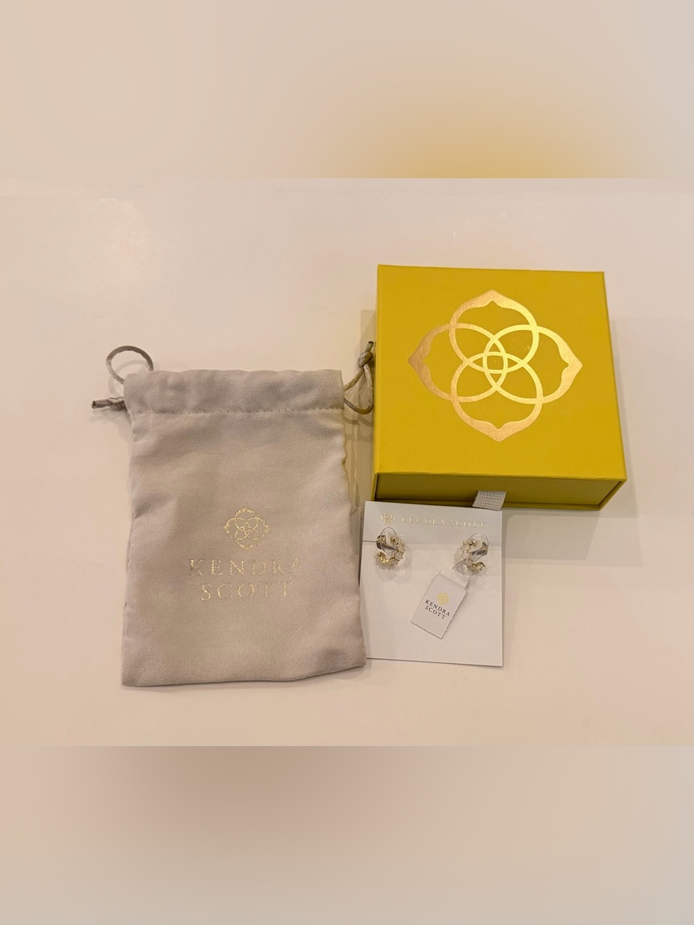 Kendra Scott Cailin Gold Huggie Earrings in White Crystal - Picture 2 of 3